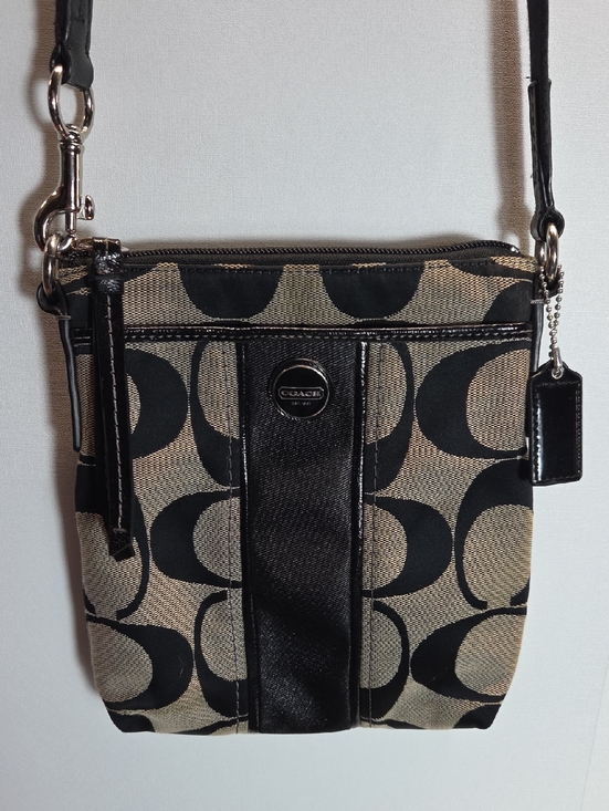 Coach Handbags - Coach Black and Tan Signature Crossbody Pouch